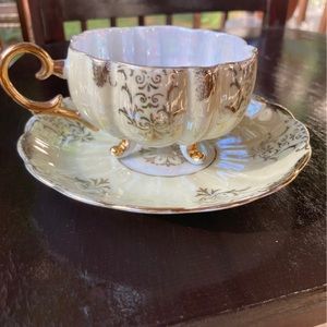 Vintage footed tea cup & saucer